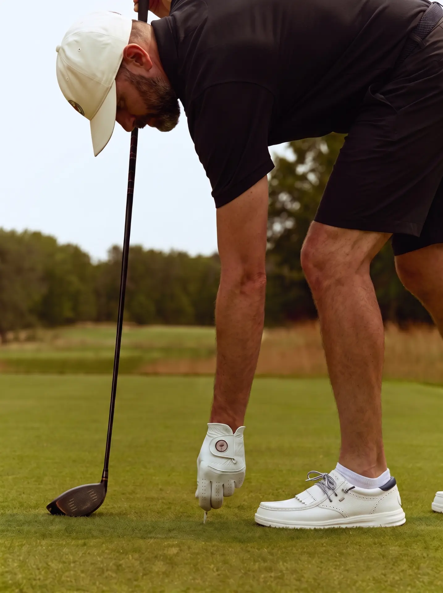 HEYDUDE golf tee moment